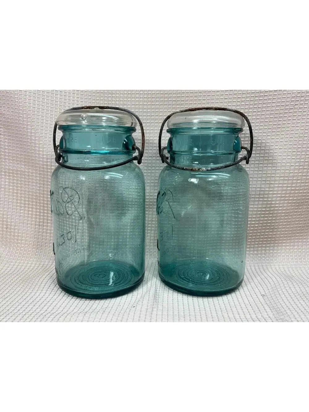 62 - 2 vintage round Blue canning jars wire lock glass lids -  Ball